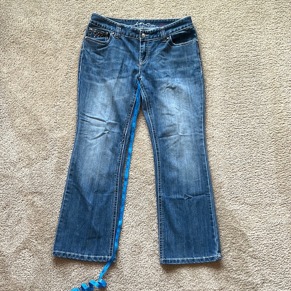 Inc brand jeans. Gently worn. Curvy fit. Boot leg style. Pretty embellishments!